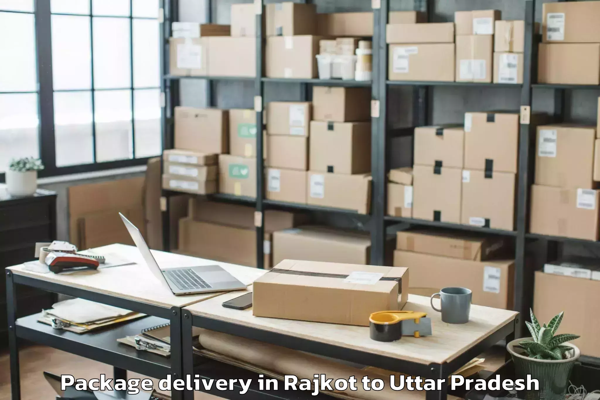 Quality Rajkot to Chandra Shekhar Azad Universit Package Delivery